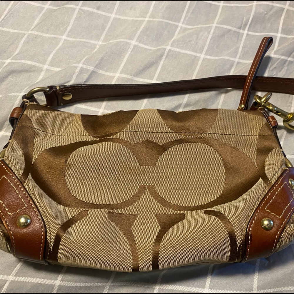 Small coach clutch/mini bag with shoulder strap